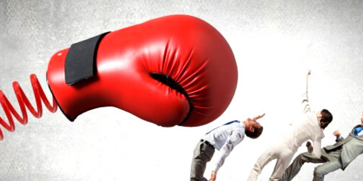Boxing Glove Hitting Office Workers